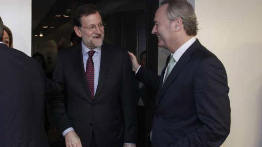 Mariano Rajoy y Alberto Fabra, tras la reunión de la Ejecutiva nacional del lunes en Madrid.