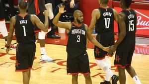 May 16, 2018; Houston, TX, USA; Houston Rockets guard Chris Paul (3) reacts with forward Trevor Ariza (1) guard Eric Gordon (10) and center Clint Capela (15) against the Golden State Warriors during the second half in game two of the Western conference finals of the 2018 NBA Playoffs at Toyota Center. Mandatory Credit: Troy Taormina-USA TODAY Sports