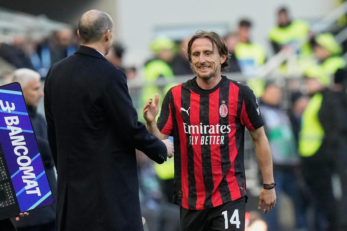 Luka Modric y Massimiliano Allegri, juntos en el Milan