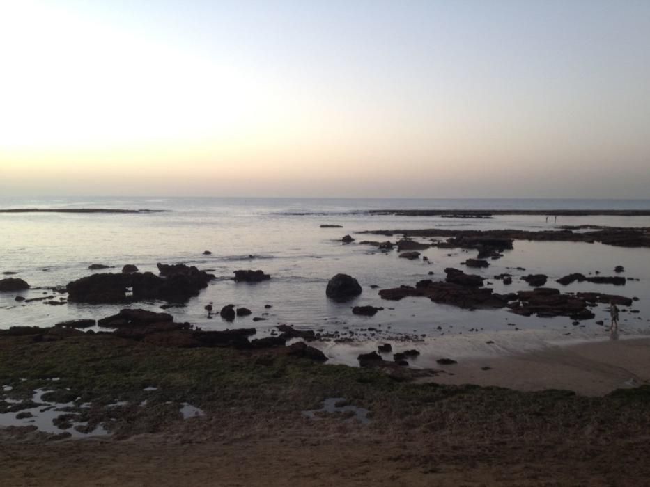 Puesta de sol en Las Canteras con marea baja