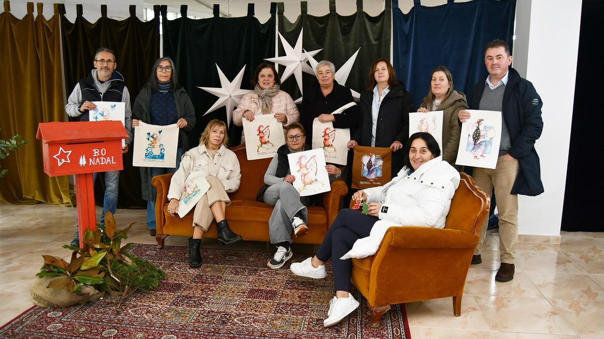 Mato, dereita, cos comerciantes, na presentación da campaña.