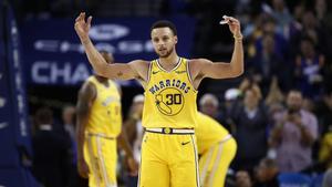 OAKLAND, CA - OCTOBER 24: Stephen Curry #30 of the Golden State Warriors reacts to the crowd chanting MVP during their game against the Washington Wizards at ORACLE Arena on October 24, 2018 in Oakland, California. Curry finished the game with 51 points. NOTE TO USER: User expressly acknowledges and agrees that, by downloading and or using this photograph, User is consenting to the terms and conditions of the Getty Images License Agreement.   Ezra Shaw/Getty Images/AFP