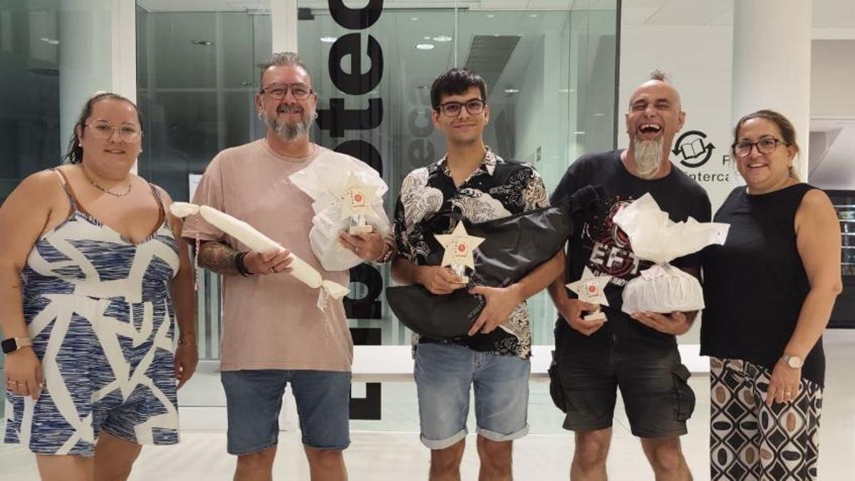 Al mig, els tres guanyadors de la Nit del Pòquer
