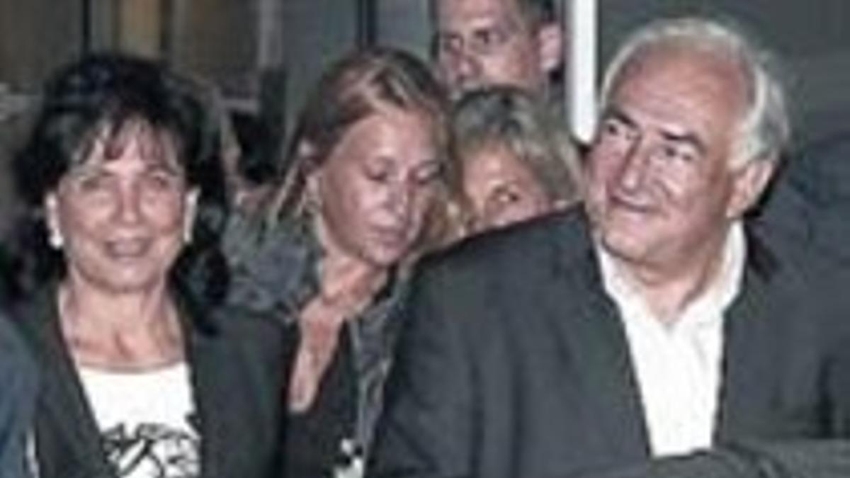 Sinclar y Strauss-Kahn.
