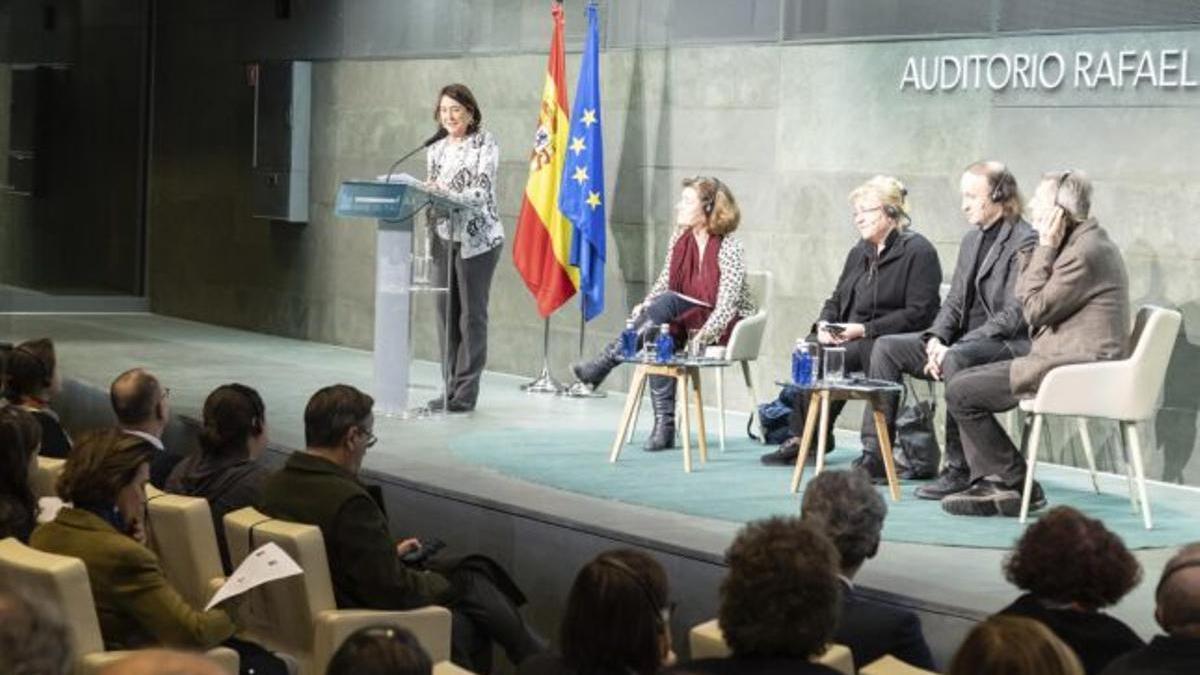 Los tres premios Nobel durante la jornada en Madrid.