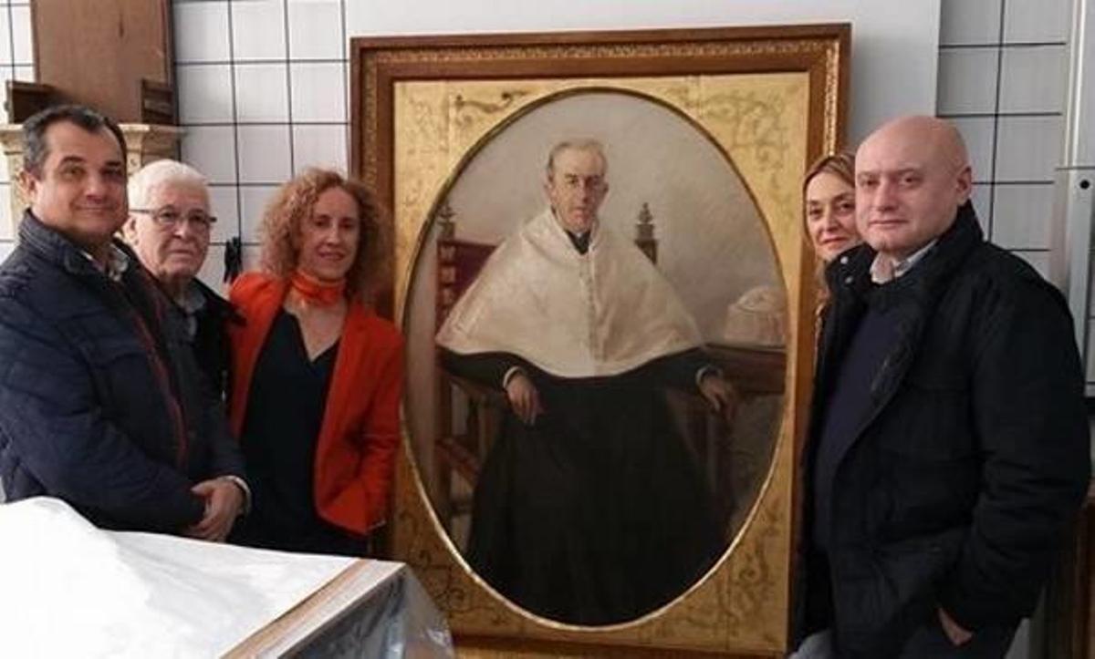 Diferentes representantes de Benimodo recogieron esta semana el cuadro rehabilitado.