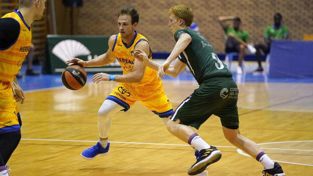 Frankie Ferrari junto a Alberto Díaz, del Unicaja, durante la pretemporada