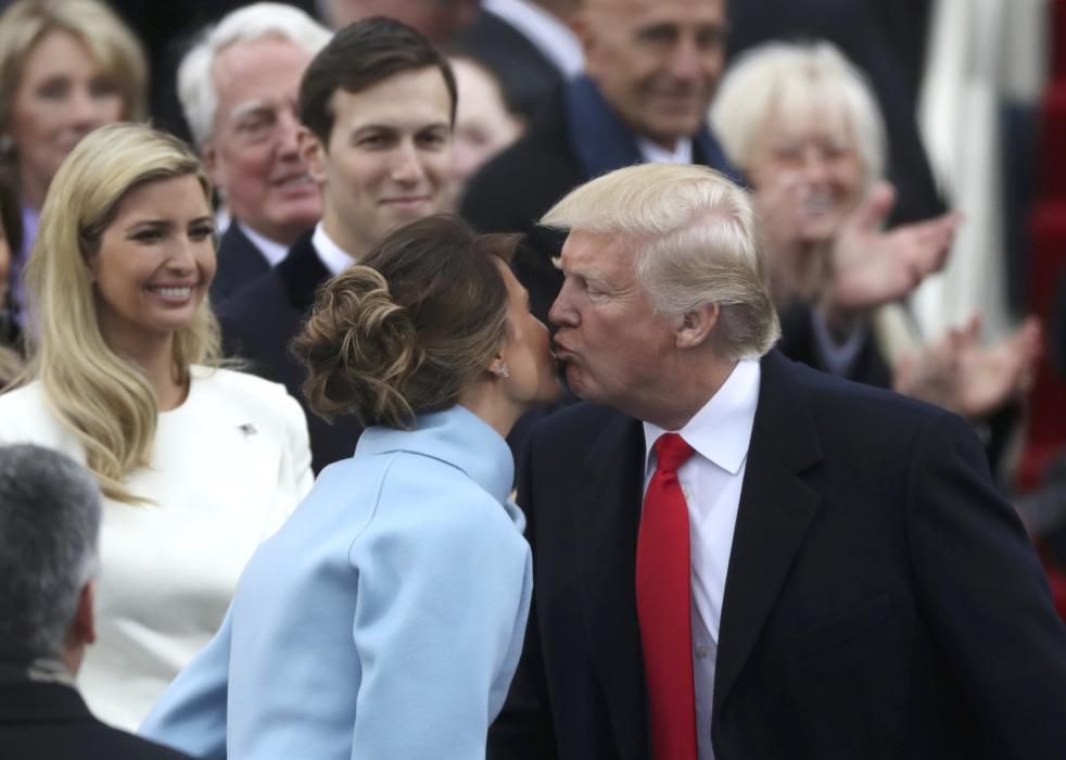 U.S. President-elect Donald Trump kisses his ...