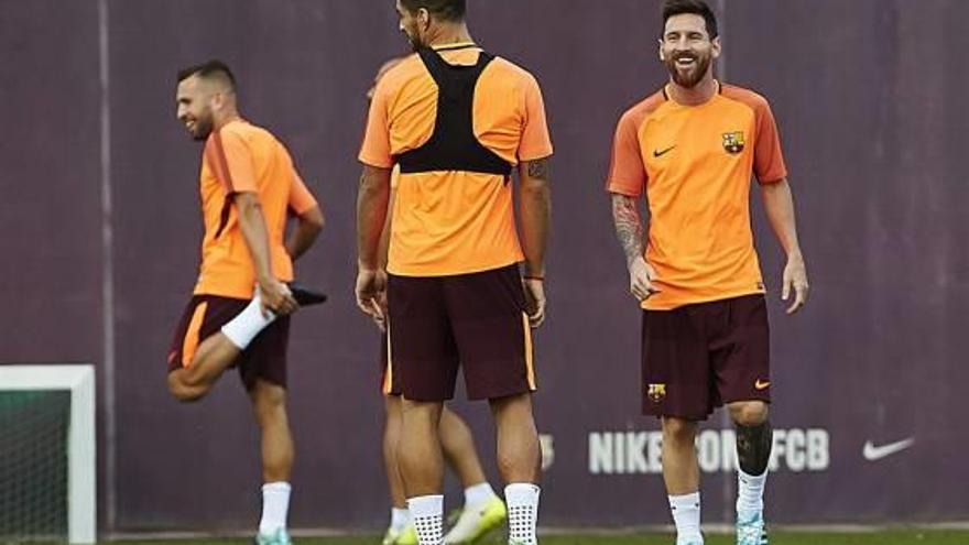 Messi sonríe durante el entrenamiento de ayer.