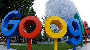 FILE PHOTO  The brand logo of Alphabet Inc s Google is seen outside its office in Beijing  China August 8  2018   Picture taken with a fisheye lens  REUTERS Thomas Peter File Photo