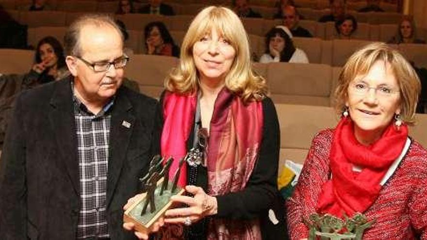 Mara Senra y Santiago Casal, premiados por AI