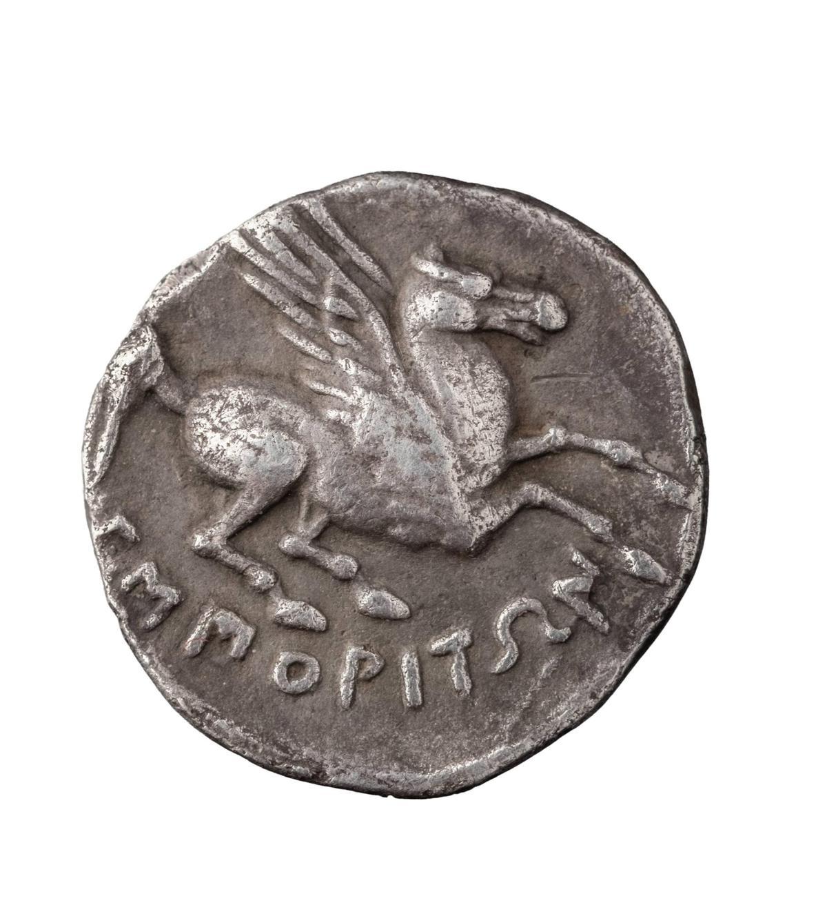El revers d'un Dracma d'Empúries del s. III a.C.
