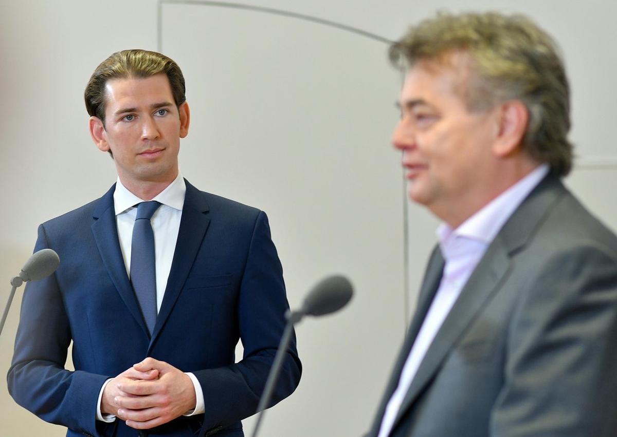 01 January 2020, Austria, Vienna: Sebastian Kurz (L), leader of the Austrian People’s Party (OeVP) and Werner Kogler, leader of The Greens, hold a joint press conference at the Winter Palace of Prince Eugene after reaching a coalition deal. Photo: Herbert Neubauer/APA/dpa