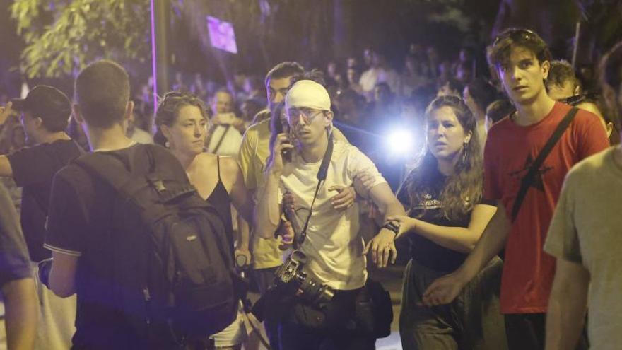 La jueza pide a la Policía que identifique al agente que agredió al fotoperiodista en la manifestación del 26J