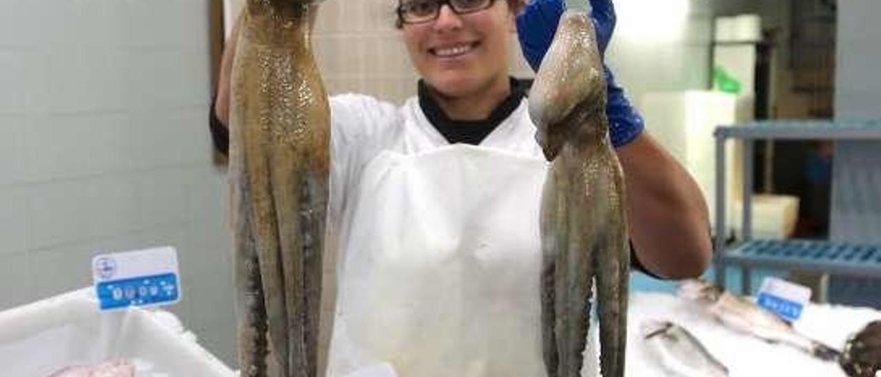 Pulpos en la pescadería de la lonja meca. // Muñiz