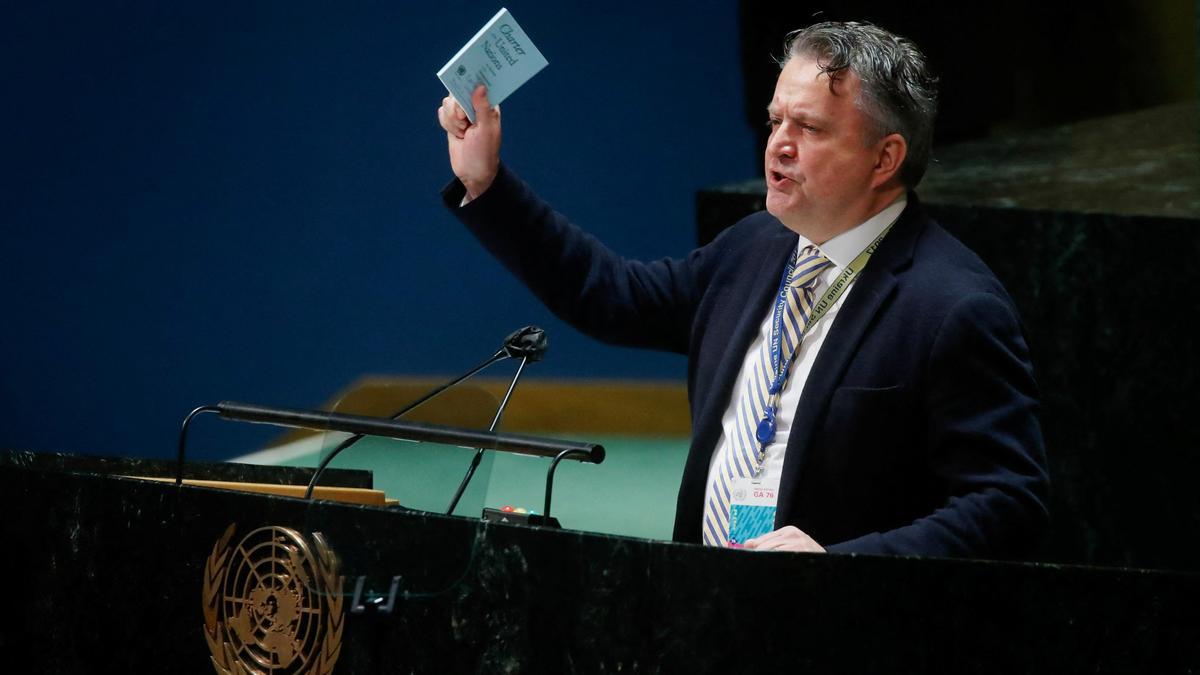 Ukrainian Ambassador to the United Nations Sergiy Kyslytsya holds the Charter of the United Nations as he speaks at the 11th emergency special session of the 193-member U.N. General Assembly on Russia's invasion of Ukraine, at the United Nations Headquarters in Manhattan, New York City, U.S., March 2, 2022. REUTERS/Eduardo Munoz