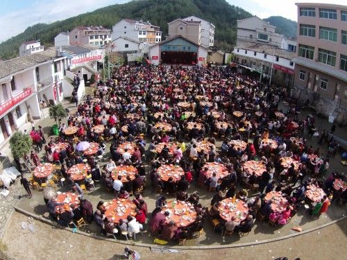 Villagers have lunch to celebrate the Spring Festival, in Taizhou