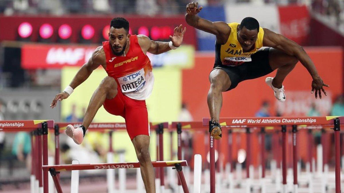 Mcleod y Ortega, durante la final de los 110 metros vallas