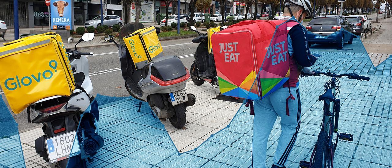 Repartidores de comida a domicilio recogen sus pedidos en un local de Vigo