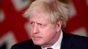 Britain s Prime Minister Boris Johnson looks on during a news conference in response to the ongoing situation with the coronavirus disease (COVID-19) pandemic  inside 10 Downing Street  London  Britain  December 19  2020  REUTERS Toby Melville Pool