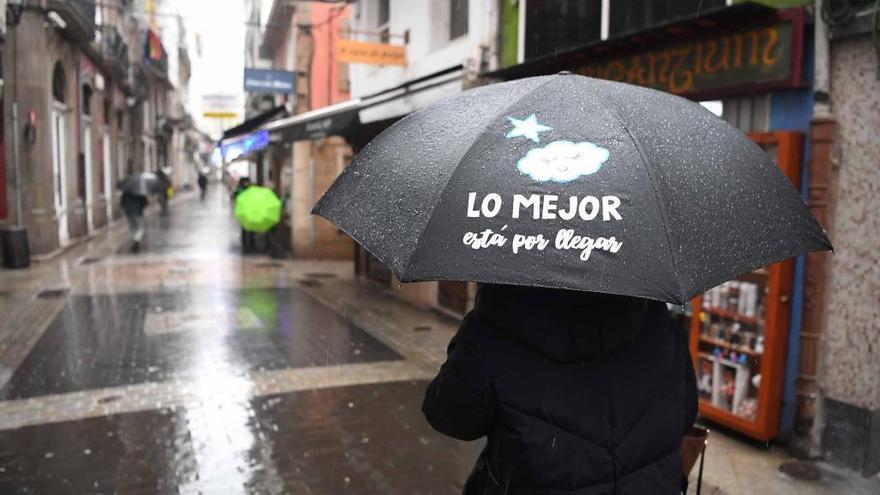 Paraguas con mensaje en una calle de A Coruña.