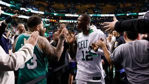 May 9, 2018; Boston, MA, USA; Boston Celtics guard Terry Rozier (12) celebrates with fans after defeating the Philadelphia 76ers in game five of the second round of the 2018 NBA Playoffs at the TD Garden. Mandatory Credit: Greg M. Cooper-USA TODAY Sports