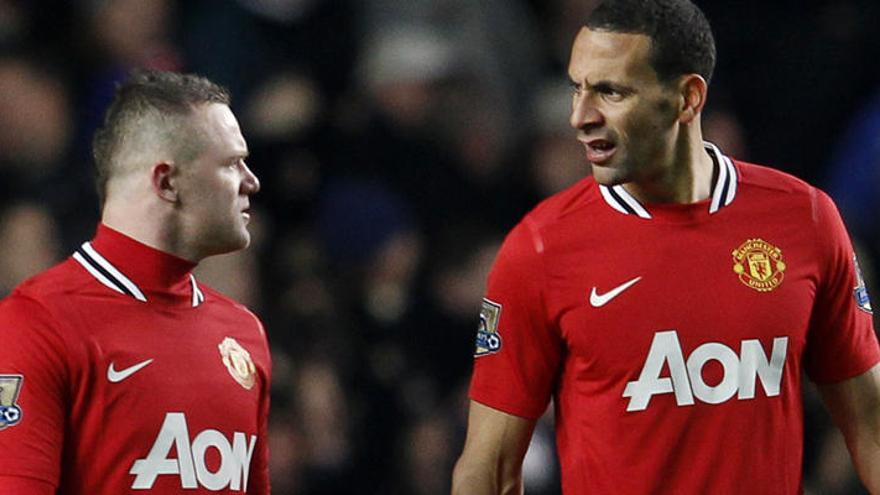 Wayne Rooney y Rio Ferdinand