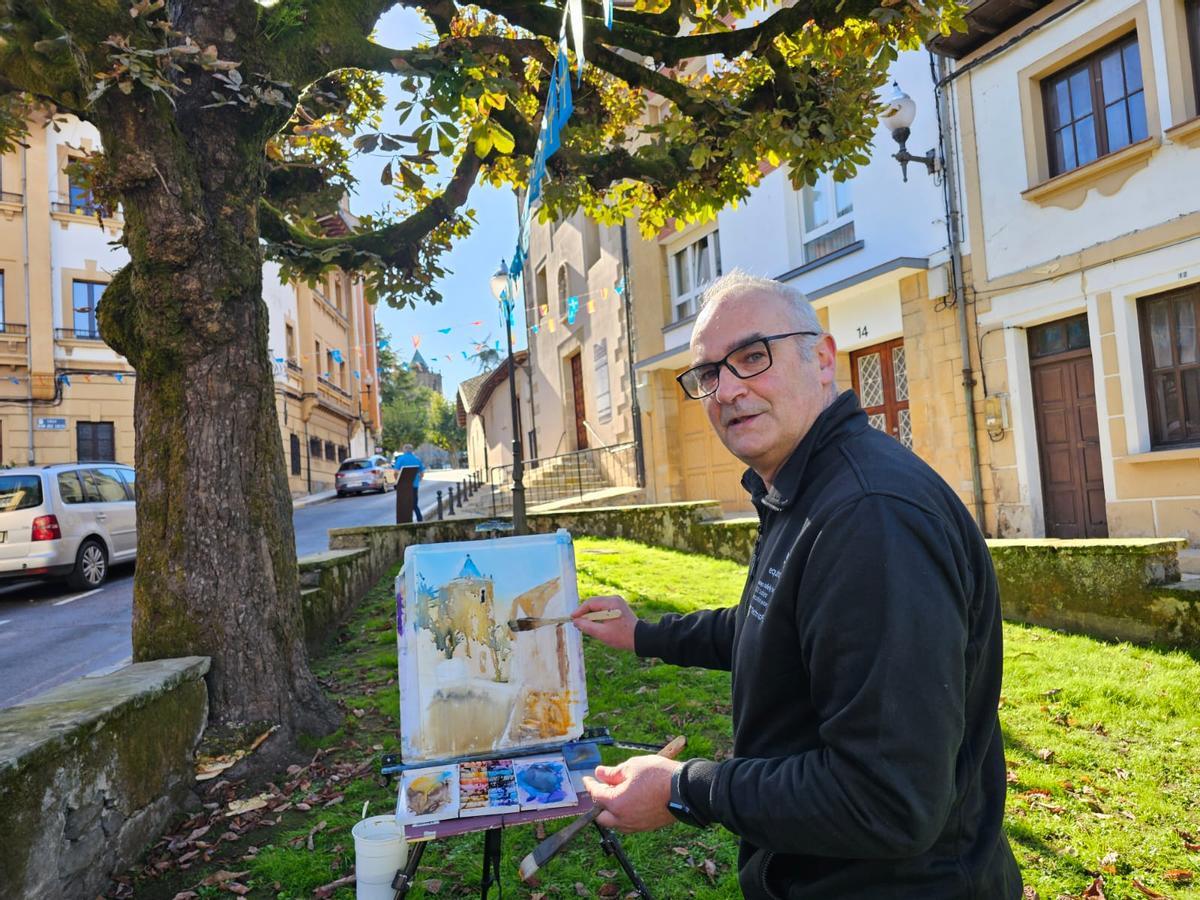 Juan Carlos Suárez, pintando.