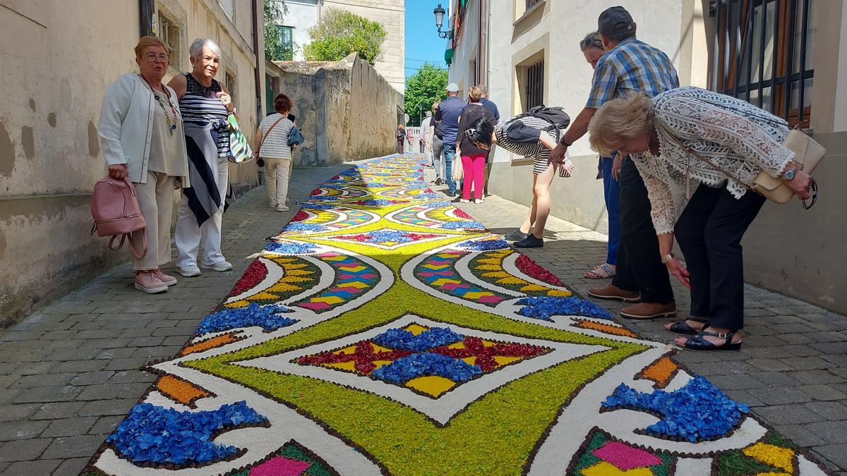 Visitantes en la calle Amor.