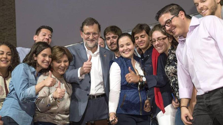 Rajoy promete en Valencia que cambiará el modelo de financiación autonómica