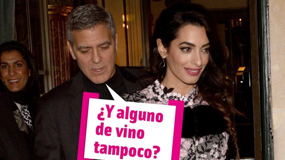George Clooney y Amal Clooney saliendo de un restaurante