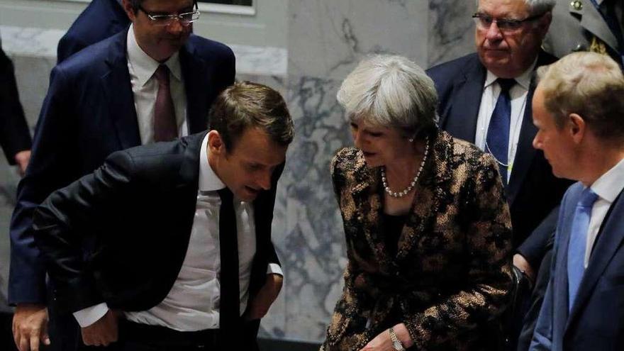 La primera ministra británica, Theresa May, con el presidente francés, Emmanuel Macron, ayer en la ONU.