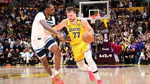 LOS ANGELES, CA - APRIL 22:  Luka Doncic #77 of the Los Angeles Lakers handles the ball during the game against the Minnesota Timberwolves during Round 1 Game 2 of the 2025 NBA Playoffs on April 22, 2025 at Crypto.Com Arena in Los Angeles, California. NOTE TO USER: User expressly acknowledges and agrees that, by downloading and/or using this Photograph, user is consenting to the terms and conditions of the Getty Images License Agreement. Mandatory Copyright Notice: Copyright 2025 NBAE (Photo by Adam Pantozzi/NBAE via Getty Images)