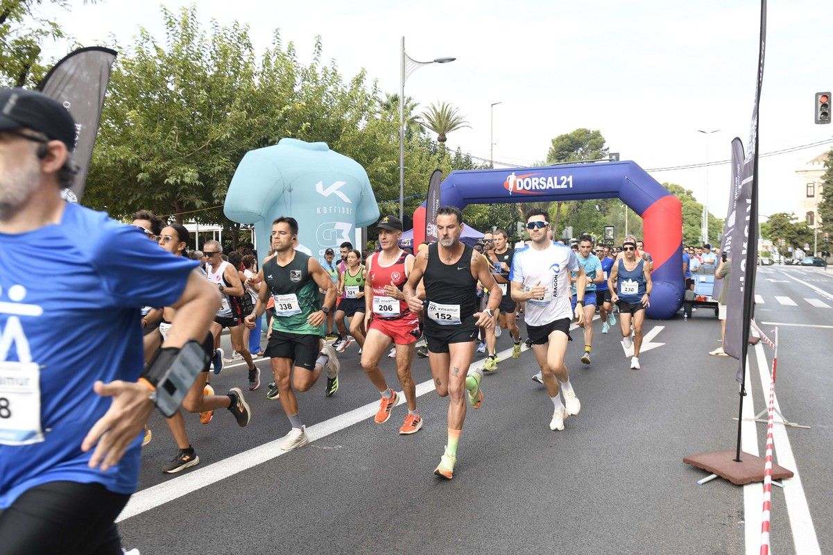 La carrera y marcha Solidaria Asteamur, en imágenes