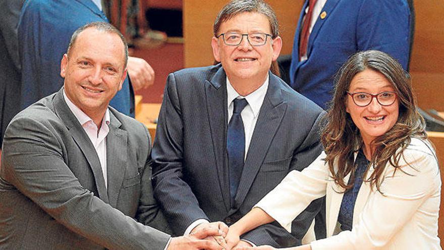 Martínez Dalmau, el presidente Puig y Mónica Oltra, en las Cortes.