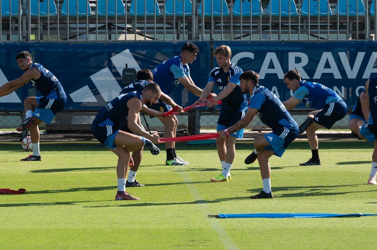 Marcos Cuenca y Jaume Jardí, este jueves en el entrenamiento del Real Zaragoza.