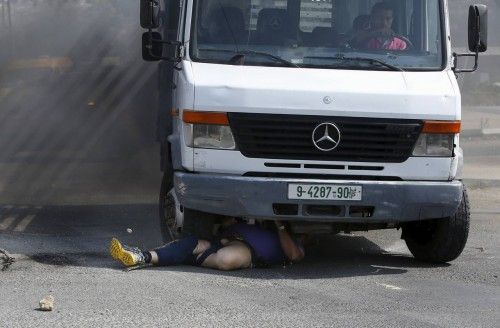 A Palestinian vehicle strikes an Israeli motorist, who died later, in the West Bank city of Hebron