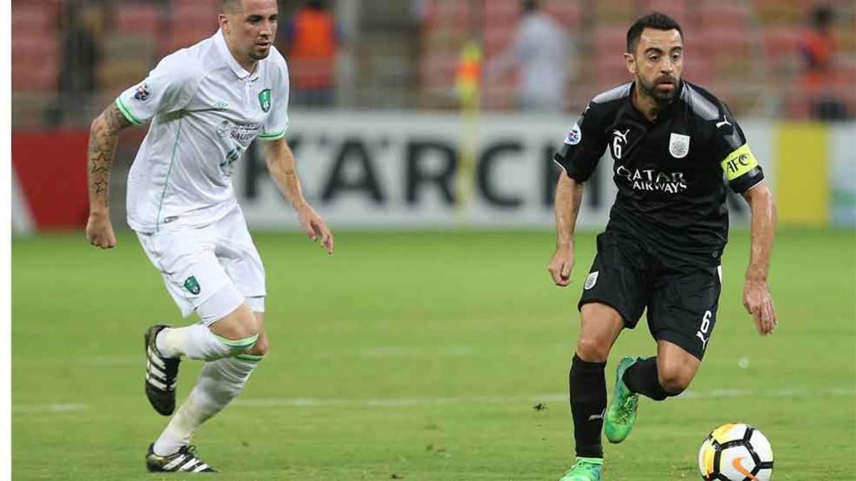 Una acción de Xavi Hernández, capitán del Al-Sadd, contra el Al-Ahli Saudí. El egarense jugará los cuartos de final de la Champions asiática