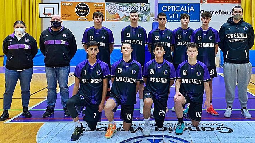 Jugadores, técnico y auxiliares del júnior de UpB Gandia. | UPBG