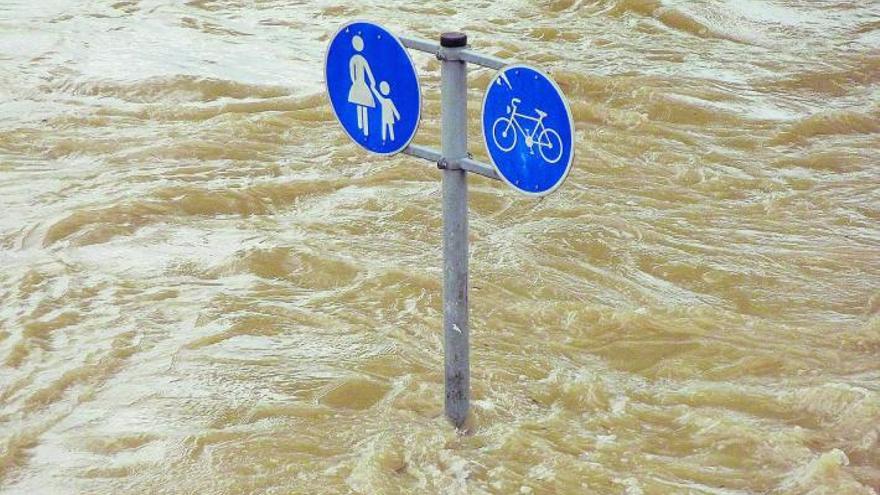 Les inundacions greus i altres fenòmens extrems són una altra manifestació del canvi climàtic. AP