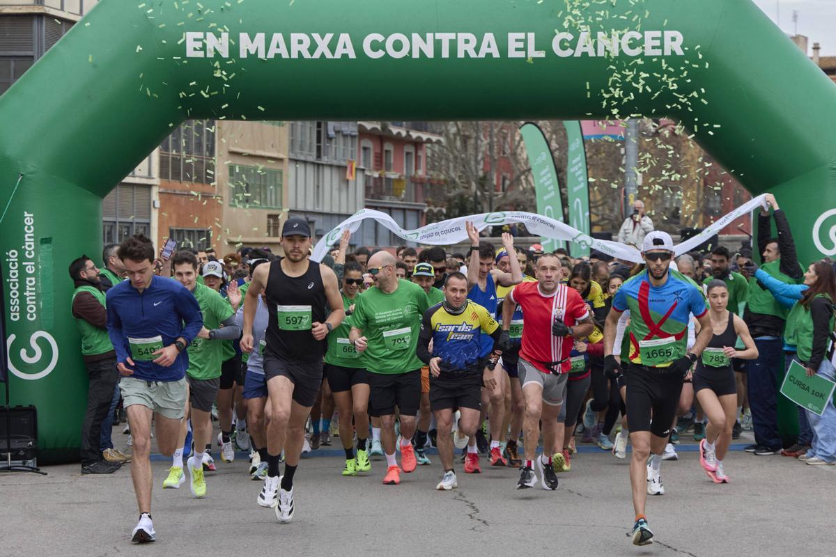 La XII Tradeinn Cursa Girona en Marxa Contra el Càncer en imatges
