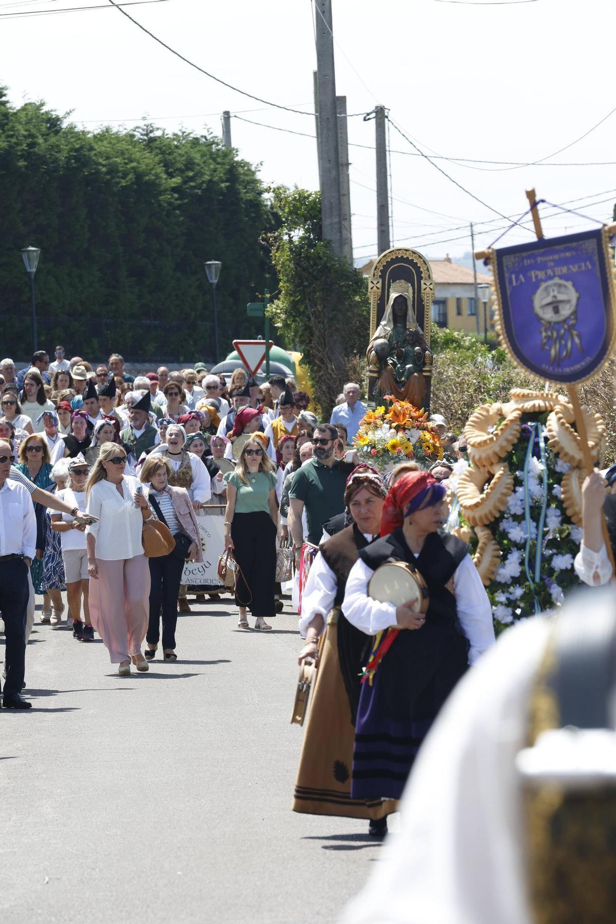 La procesión de la Virgen de La Providencia en Gijón, en imágenes