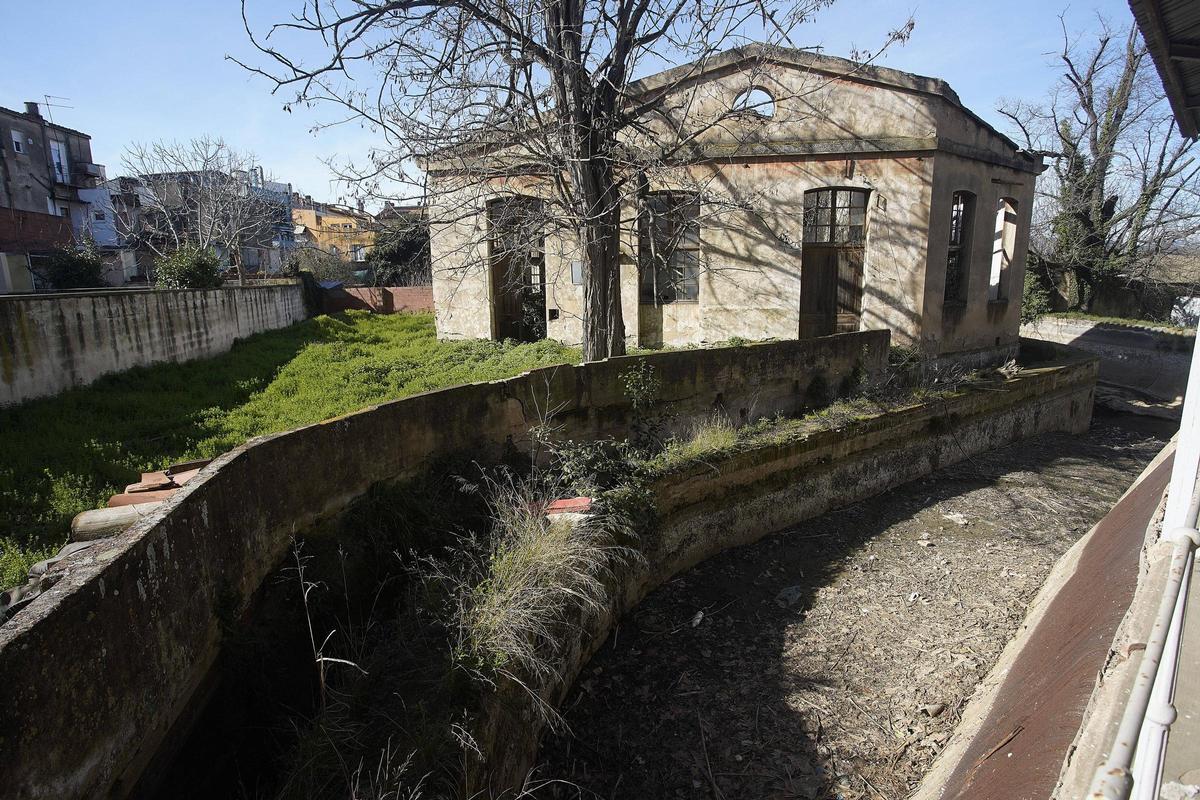 Les fotos de l'antic taller de la Marfà que es convertirà en un espai d'horticultura