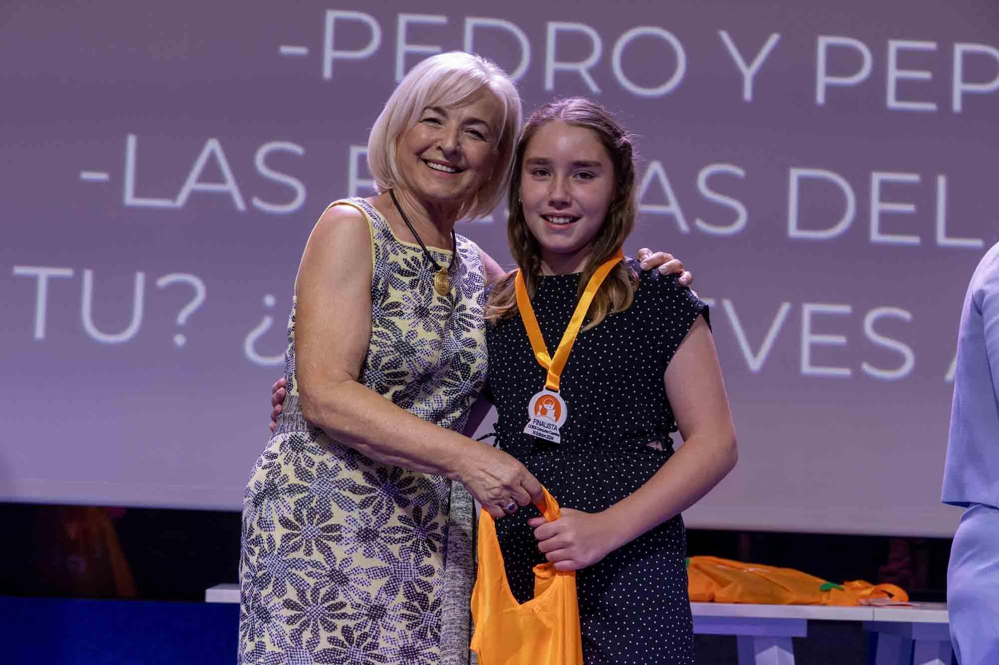 Entrega de premios del concurso infantil de relatos cortos "Cuéntame un cuento para comer" en el Club INFORMACIÓN organizado por COES