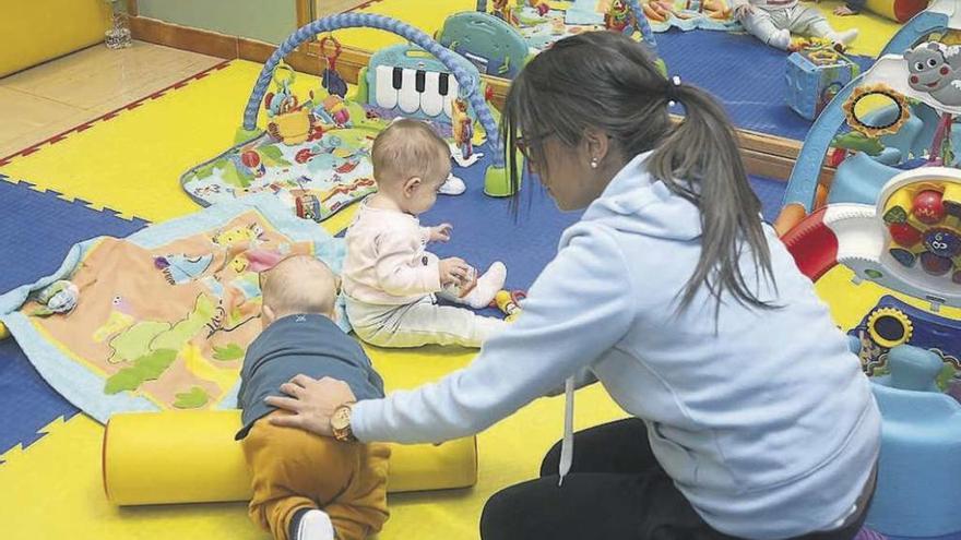 Varios niños en una escuela infantil gallega.