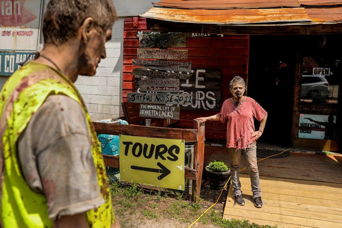 Signs showing many movies that have been filmed in the area are on display as Walkers wait for The Walking Dead Tour to begin at the site of a Season 3 location of the hit AMC series in Haralson, Georgia, U.S. June 15, 2019. Picture taken on June 15, 2019.  REUTERS/Chris Aluka Berry