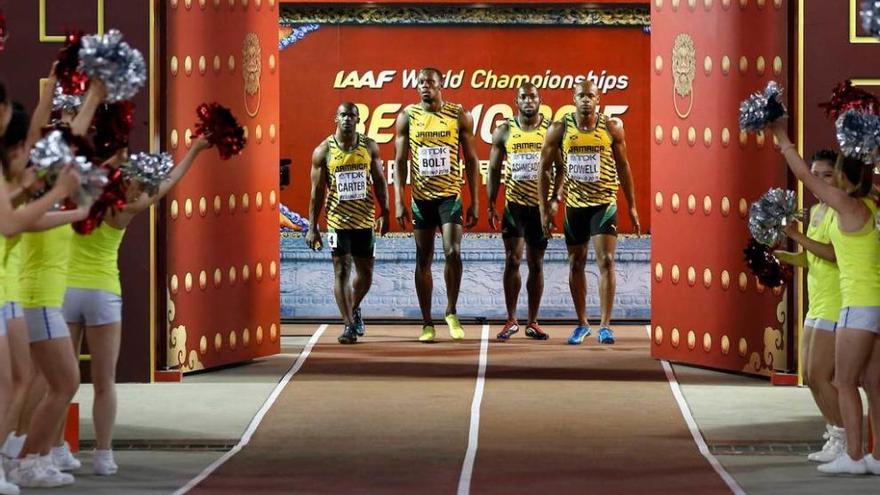 Nesta Carter, Usain Bolt, Nickel Ashmeade y Asafa Powell, antes de la final del 4x100.