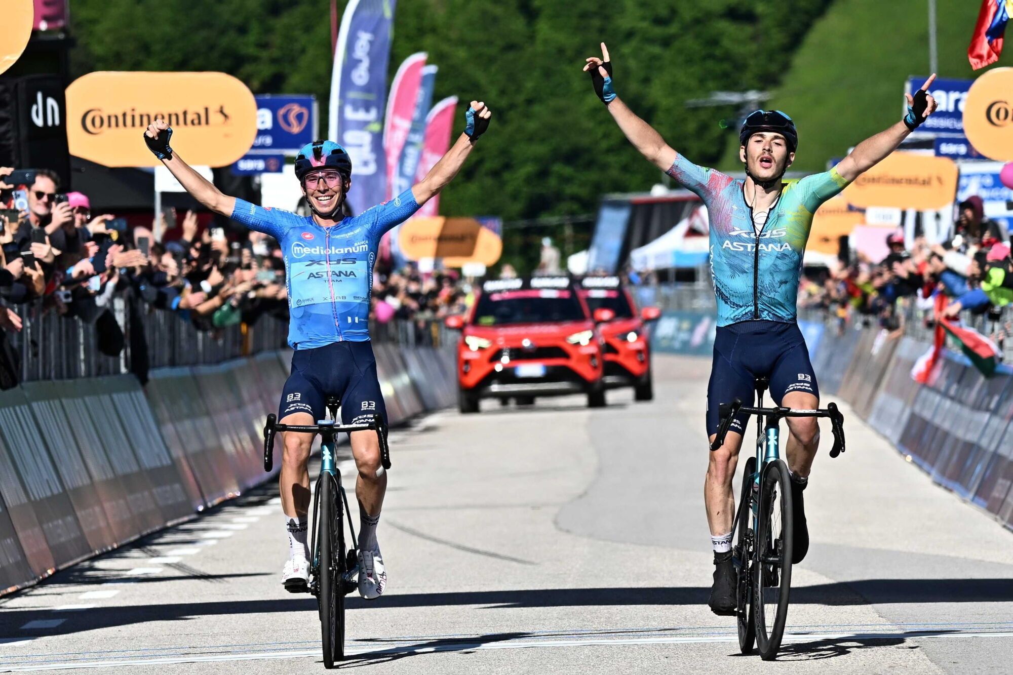 SAN VALENTINO (Italy), 27/05/2025.- Italian rider Lorenzo Fortunato of XDS Astana Team wearing the best climber's blue jersey and Italian rider Christian Scaroni of XDS Astana Team celebrate after crossing the finish line and win the 16th stage of the 108 Giro d'Italia 2025, cycling race over 203 km from Piazzola sul Brenta to San Valentino, Italy, 27 May 2025. (Ciclismo, Italia) EFE/EPA/LUCA ZENNARO