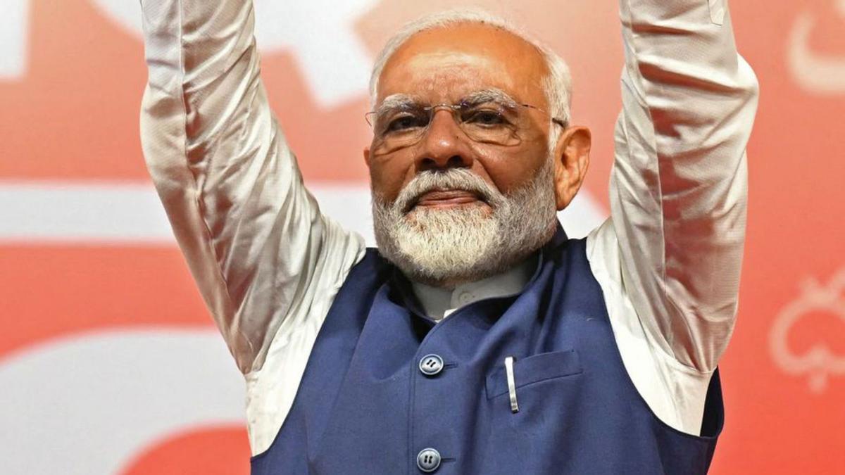 Narendra Modi a la seu del BJP, ahir. | MONEY SHARMA / AFP