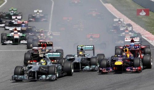 Mercedes Formula One driver Rosberg leads going into the first curve in the first lap during the Spanish F1 Grand Prix in Montmelo